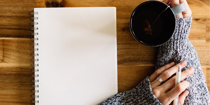 Image of a person preparing to write